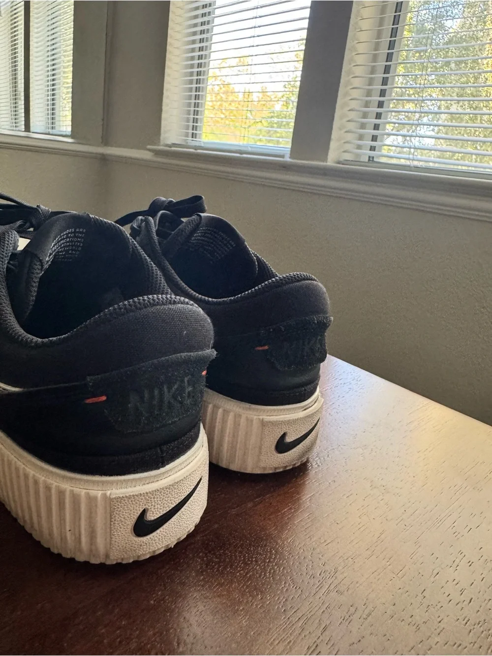 Nike Black with White Swoosh Elevated Low-Top Sneakers